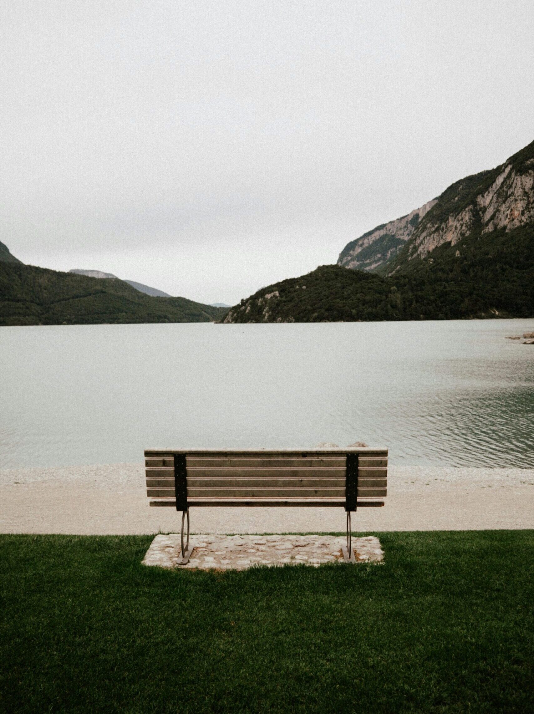view of serene lake symbolizing reality & hard lessons