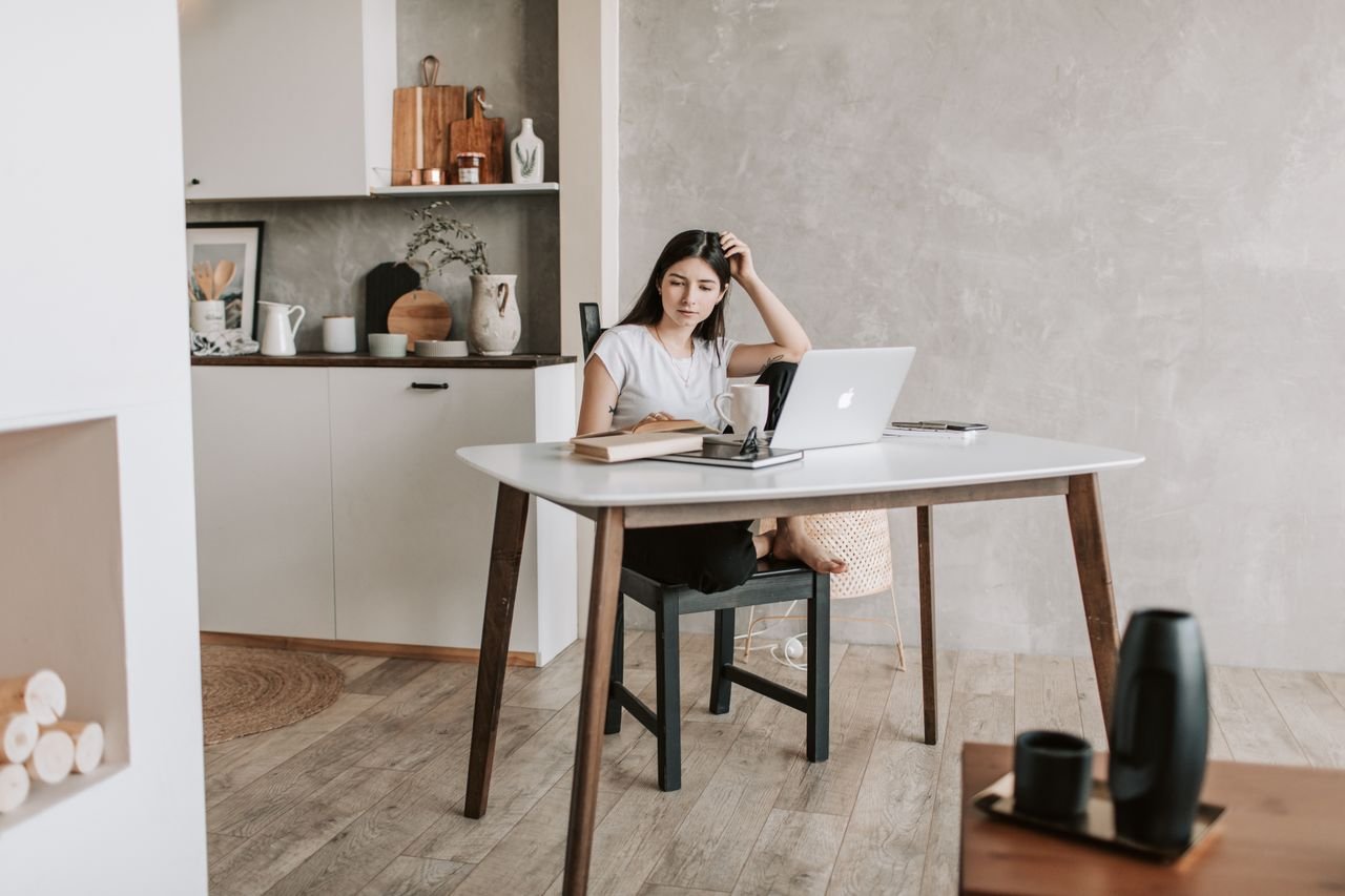 Person working on a laptop while starting a freelancing journey