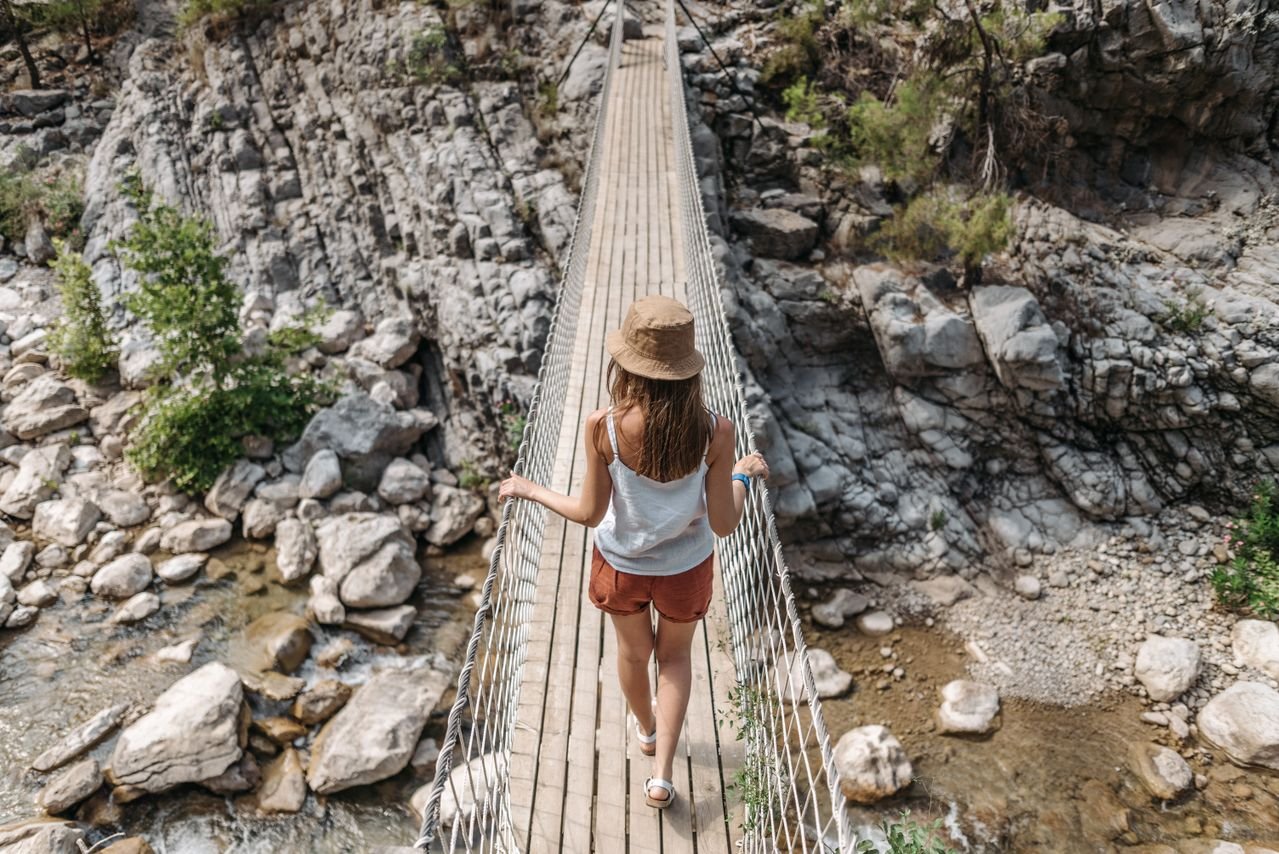 Woman walking alone representing emotional independence and trusting herself and not needing validation from others